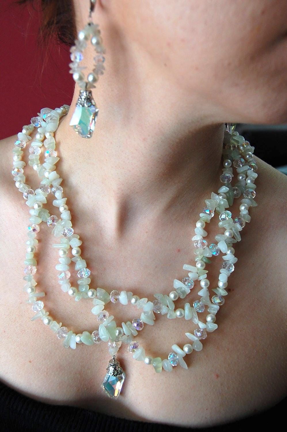 A luminous layered set featuring white jade, citrine, and faceted crystal accents.